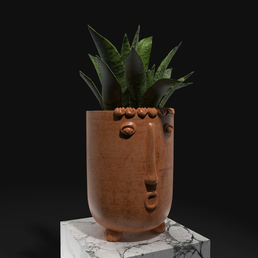 a potted plant sitting on top of a marble block